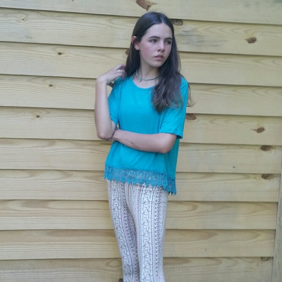 Turquoise High-low style children's shirt. - Picture 1 of 3